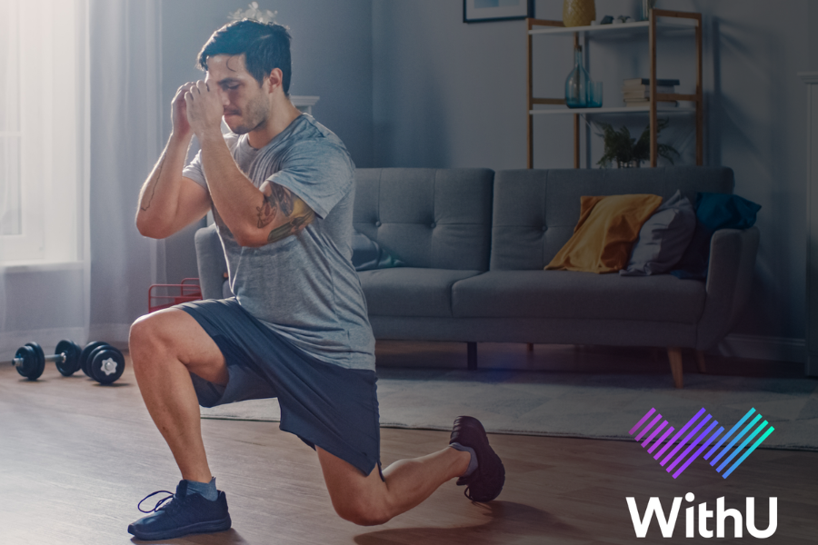 Man doing lunges and weights in his living room.  Home workout using WithU App.